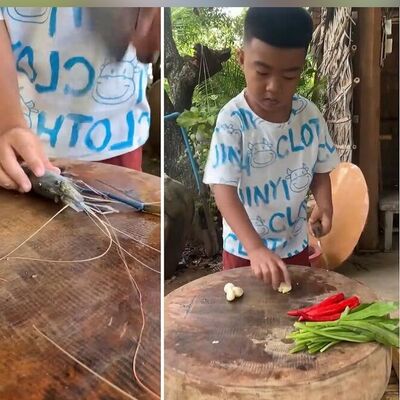 (ویدئو) آشپزی در طبیعت توسط پسر بچه روی تخته سنگ / فقط مهارت روغنی کردن سنگ دیدنیه، عجب استعدادی!!